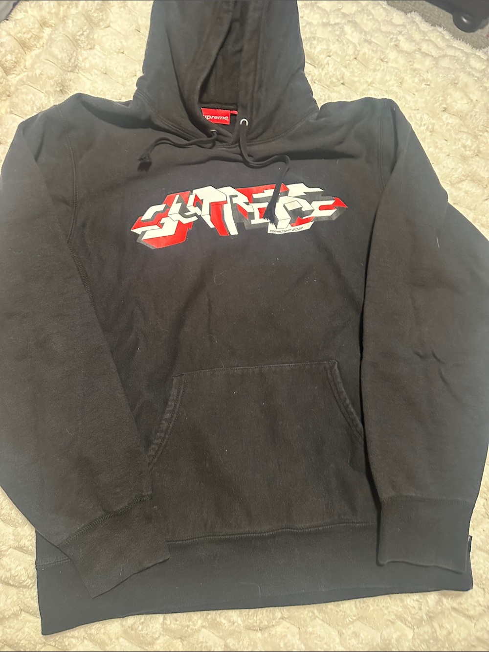 Supreme Black Hoodie with Red and White Graphic